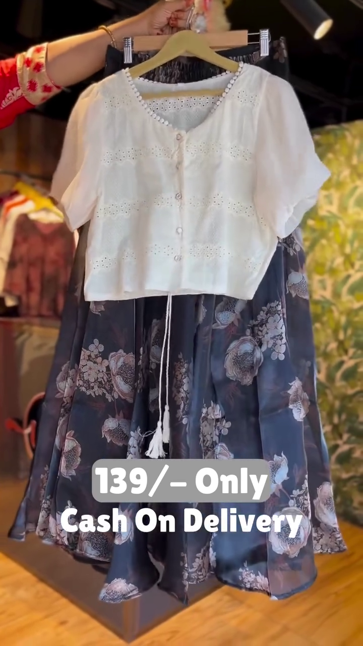 elegant white top with floral flowy skirt